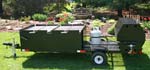 Custom BBQ Trailer With (2) BBQ 144 Chicken Cookers and (1) PR60G Pig Cooker