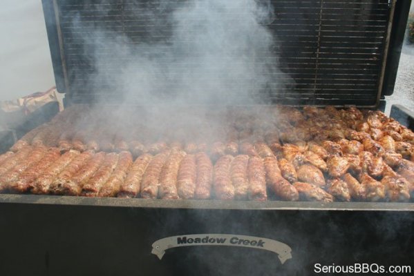 Sausage and Chicken Wings on a Meadow Creek BBQ42